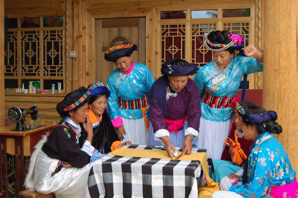 When Kinship Is Traced Through Women, Their Health Follows A study finds that there may be health benefits when family ties are linked through mothers and women head households. Anthropologists have long been intrigued by the Mosuo, an ethnic Chinese community that lives in Yunnan province. The Mosuo share a common language and cultural practices, but they are unique in that they maintain what anthropologists call two different kinship systems: matriliny and patriliny. More specifically, inheritance passes from mothers to their children among the matrilineal Mosuo and from fathers to sons among patrilineal Mosuo. Globally, matriliny is less common than patriliny—and some societies now link inheritance and kinship through both parents. In general, women have greater autonomy and control of resources in matrilineal Mosuo communities. The reverse is true in patrilineal ones. This difference could be powerful. A study published last fall in the Proceedings of the National Academy of Sciences comparing the two Mosuo communities suggests cultural factors such as gender norms can significantly contribute to differences in men’s and women’s health. Their findings suggest that women’s health improves significantly in matrilineal communities. “This is an exceptionally cool study,” wrote Robert Quinlan, an anthropologist at Washington State University, in an email to SAPIENS. Quinlan, who did not participate in the work, added that the new findings show that “the way people think about kinship influences gender differences in chronic disease risks.” The new findings come from an interdisciplinary team, including anthropologists, biologists, and demographers from the United States and China who studied the Mosuo. he researchers compared men and women in the two groups for hypertension, a risk factor for numerous diseases, and checked their blood for a biomarker linked to chronic inflammation, which can lead to many health problems, including cardiovascular disease and Type 2 diabetes. According to the research team’s leader Siobhán Mattison, an evolutionary anthropologist at the University of New Mexico, she and her colleagues found no significant differences in these measures among men in the matrilineal and patrilineal groups. The situation for women, however, told a different story. In the patrilineal communities, women had a significantly higher prevalence of hypertension and the biomarker linked to inflammation than men. For example, 37.4 percent of these women had a higher prevalence of hypertension, compared with 29.7 percent of men. Women in these groups also had more than double the rate of inflammation compared with men. “The way people think about kinship influences gender differences in chronic disease risk,” says anthropologist Robert Quinlan. This pattern was reversed in the matrilineal communities. Women had lower rates than men for both the inflammation biomarker and hypertension, with much smaller differences between men and women overall. The researchers also studied whether being the head of a household—whether male or female—might relate to health. They found that heads of households had lower inflammation markers but a higher prevalence of hypertension than others in their society. Though the authors are unsure how to explain the elevated prevalence of hypertension, they note that household heads generally have more autonomy in their decision-making and better access to resources. Both factors could help reduce the likelihood of disease. These findings, Mattison notes, suggest that greater support and agency among the matrilineal Mosuo benefit women’s health. It’s also possible that having a woman head a household improves the health of other women and girls in that home. “Men aren’t doing worse, under matriliny, it’s just that women seem to be doing better,” she says. The new findings fit into a larger set of studies involving matriliny, patriliny, and patriarchy. Broadly, matriarchy and patriarchy are defined as systems related to power within a society—whereas matriliny and patriliny relate to issues of inheritance and determining kin. Many societies are both patriarchal and patrilineal, but many anthropologists doubt the existence of a true matriarchy today because, even in the matrilineal societies, men typically maintain powerful government and community roles. Christopher von Rueden, an anthropologist at the University of Richmond, who was not involved in the Mosuo study, notes that the new work suggests “matrilineal and patrilineal systems affect the psychology of women and men differently, particularly related to [a] sense of control and stress.” Past studies comparing matrilineal and patrilineal communities suggest something similar. For example, von Rueden cites a comparison of the patriarchal and patrilineal Maasai in Tanzania with the matrilineal Khasi in India. That work, published in 2009, suggests that men are more competitive than women in patriarchal communities and women are more competitive than men in matrilineal groups. And a 2019 study suggests that girls are less risk averse than boys in matrilineal Mosuo communities when they first enter school—but this pattern reverses over time as the students attend schools where most other pupils are part of the traditionally patriarchal Han ethnicity in China. The new study of Mosuo communities suggests having a woman head the household may benefit the health of other women and girls in that home. Visual China Group via Getty Images According to von Rueden, patrilineal and matrilineal families give men and women different opportunities for social networking, occupations, and levels of control within a household. It’s possible, he notes, that the new health-linked findings from the Mosuo reflect the fact that the women in matrilineal groups have more social support from their closest kin and that, more so than autonomy, supports health. There may also be differences in wealth in these kinship systems that contribute to the findings. Further study could clarify which of these factors is most powerful in understanding health and well-being outcomes in men and women. Katherine Wander, an anthropologist at Binghamton University and one of the study authors, hopes their work influences public health. “The current approach,” she argues of health interventions, “tends to treat women as though they’re rather lacking in social context.” And Quinlan noted an added lesson in the fact that the men in matrilineal and patrilineal communities had similar health outcomes. “Matriliny doesn’t reverse gender biases so that women dominate men,” he explained. “It seems to reduce inequality significantly for a healthier population overall, at least among Mosuo people.”-anthropology vishnu ias